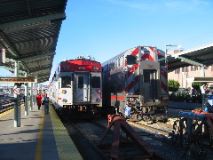 Side-by-side: Caltrain rolling stock new and old.