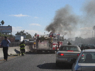 Burning car on Hwy 101 S near Marsh Road Exit
