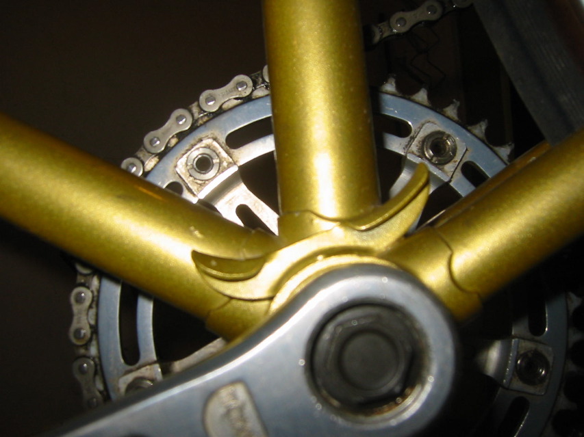 Bottom Bracket cluster: the elegant cable-routing lug.