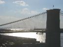 View of the Brooklyn Bridge and the Statue of Liberty from the Manhattan Bridge.