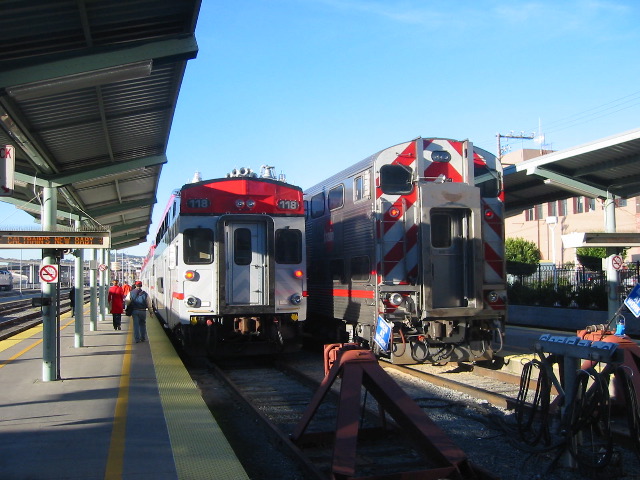 Side-by-side: Caltrain rolling stock new and old.